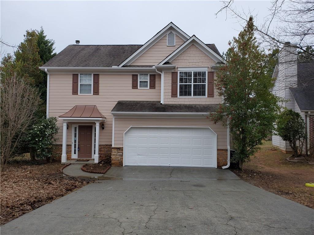 Enjoy your privacy without giving up the perks of a city with this 3 beds 2.5 baths two story traditional home in great community— this recently renovated two-story home sits on a quiet street in Lilburn’s neighborhood, just two blocks from shopping, dining, parks and public transit. Family room has fireplace, hardwoods throughout main level, neutral paint, new carpet. Spacious Kitchen features granite, breakfast bar with keeping/eating area all stainless steel appliances and refrigerator. The living room opens up to a fully fenced backyard! MAKE IT YOURS!