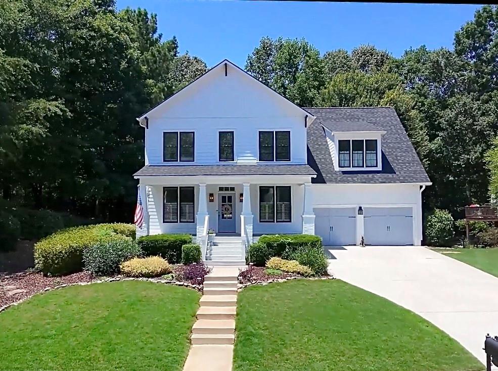 Welcome to this exquisite John Weiland-designed estate, where timeless architectural details blend seamlessly with modern sophistication. From the moment you arrive, the stunning curb appeal, rocking chair front porch, and lush landscaping set the tone for the elegance within.
Step inside to discover rich hardwood floors, intricate millwork, designer wall coverings, and classic plantation shutters that elevate every room. The grand foyer opens to a formal dining room and a versatile sitting room—perfect as a home office, library, or den. The heart of the home is the inviting family room, anchored by a gas fireplace framed with built-in bookcases and large picture windows that bathe the space in natural light. The adjacent chef’s kitchen is thoughtfully upgraded with expanded countertops ideal for entertaining, premium appliances, and a spacious breakfast area that opens to a private back deck—offering tranquil, seasonal views of the golf course and a fenced backyard oasis.
Upstairs, you’ll find three generously sized secondary bedrooms, a Jack-and-Jill bath, a versatile open loft, and the impressive sunken primary suite. This serene retreat features dual walk-in closets, a spa-like ensuite with a Whirlpool tub, and panoramic backyard views. The terrace level offers expansive living and entertaining possibilities, including a large living room, kitchenette, full bathroom, additional bedroom, and a dedicated home theatre/media space—perfect for lounging, hosting movie nights or hosting guests.
Ideally located beside one of the neighborhood’s beautifully landscaped pocket parks, this home enjoys enhanced privacy, open green space, and a true sense of community. Residents enjoy resort-style amenities, including a championship golf course, tennis courts, aquatic complex, playgrounds, and easy access to upscale shopping, dining, and the world-renowned Château Élan Winery & Resort.
This is much more than a family home—it’s a lifestyle. Welcome to luxury living at Reunion Country Club.