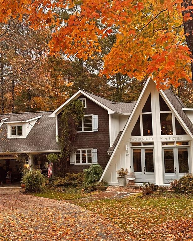 Ever wanted a house next door to family or friends to share life together? If a connected lifestyle with your own private space sounds appealing you will love this one! Rare Multi-Generational Retreat on 1.25 Acres – Two Distinct Homes on Side-by-Side Lots! (216 and 218 Don John Trail) 
Welcome to an extraordinary opportunity to own two very unique, character-filled homes on two separate, side-by-side lots at the end of a quiet cul-de-sac—in Woodstock! These homes are not in an HOA neighborhood, but on a quiet street with different style homes and larger lots with friendly neighbors. Once you arrive, you will realize you have plenty of space to stretch out and enjoy entertaining and relaxing, but also centrally located to everything. Ideal for multi-generational living, extended families, share ownership or short-term rental potential. Spanning approximately 1.25 acres in a top-rated school district, this one-of-a-kind setup offers privacy, flexibility, and a strong sense of community—just minutes from major highways, shopping Downtown Woodstock and Lake Allatoona.
Each home has its own private driveway, along with a shared central drive that leads to TWO oversized storage sheds, perfect for tools, equipment, or workshop/hobby space.
Both homes are surrounded by beautifully and thoughtfully designed landscaping, featuring azaleas, hydrangeas, climbing roses, camellias, and more.
Home 1 Highlights (Custom A-Frame):
Originally built as a classic A-frame in the 1970s, then completely redesigned and expanded in 2015 into a stunning, one-of-a-kind residence
Bonus room over the garage with wet bar and large deck overlooking the pool
Private hot tub, outdoor shower, and peaceful outdoor living areas
Tongue and groove ceilings throughout and casement windows adding architectural style
Professional landscape lighting to showcase the home’s beautiful exterior
Fire pit, walk-in pantry with sink and designed for additional refrigerator and freezer space, charming kitchen and thoughtfully designed coffee station
Home 2 Highlights (Poolside Cottage with amazing sunsets):
Updated in 2020 with stylish finishes and modern conveniences
Spacious in-ground pool with surrounding decks and patios—perfect for entertaining or relaxing
Master suite on the main level for easy, accessible living
A flat yard and plenty of garden space
Tongue and groove ceilings add charm and texture throughout
Fire pit, walk-in pantry, lovely kitchen, and custom coffee station
Both homes offer an ideal balance of shared and independent living, with amazing outdoor spaces to host and relax. Garden space too! Whether you're living together or side by side, this property offers unmatched flexibility and charm.
Location couldn’t be better—just 10 minutes from downtown Woodstock and 18 minutes from downtown Acworth, with easy access to I-575 and I-75. Plus, only 15 minutes from Kennesaw State University and 25 minutes from Truist Park, home of the Atlanta Braves. Perfect for commuters, students, travelers, or game-day guests.
This setup also presents a rare opportunity for investors—with two separate homes, it’s ideal for Airbnb or short-term rentals. Please Note: Because of the custom design and unique layout, the properties may not appraise for full market value. For this reason, buyers with cash offers or pre-approved, secured financing are preferred.
Professional pics coming soon!!! Showings begin October 28th, 2025 – Don’t miss your chance to explore this rare and versatile property in person!