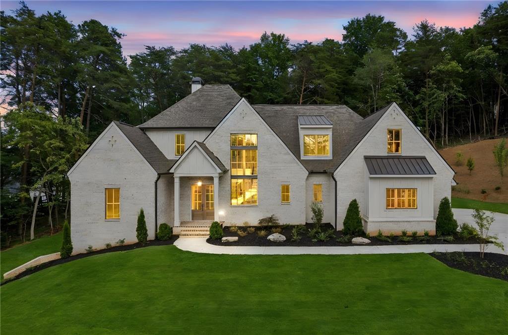 Welcome home to this stunning custom-built residence by J. Alan Custom Homes, located in the newly gated community of Pilgrim Mill Farms. Situated on approximately 2.965 private acres, this thoughtfully designed home offers 4 bedrooms, 3.5 bathrooms, and an unfinished basement ready for your personal touch. Prime location less than a mile to Tidwell Park on Lake Lanier and under 4 miles to GA 400, with top-rated schools, shopping, and dining nearby in the rapidly growing Cumming/North Forsyth area.
Enjoy seamless main-level living with an open-concept layout, a spacious scullery, and top-of-the-line finishes throughout. The main level also features a luxurious primary suite with its own laundry room, while a second laundry area is conveniently located on the main floor.
Upstairs, you’ll find three generously sized secondary bedrooms and an optional bonus room perfect for a media room, playroom, or office. Step outside to a large covered back porch—ideal for your morning coffee or entertaining guests in a peaceful, wooded setting.
Pilgrim Mill Farms is an exclusive enclave of five estate-size homesites, offering the perfect blend of privacy and convenience. This one is move-in ready for your buyers today!
Entrance to development is 4395 Pilgrim Mill Rd.