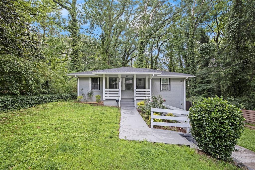 Located just minutes from I-285 and convenient daily shopping and dining, this spacious home offers 5 bedrooms and 3 full bathrooms. The main level features an open-concept layout with a living room, dining area, and kitchen with a breakfast bar—ideal for both everyday living and entertaining. Three bedrooms and two full bathrooms are also located on the main level, including the primary ensuite with a walk-in, glass-framed shower. The fully finished lower level includes two additional bedrooms, one full bathroom, a second living area, and a full kitchen with its own breakfast bar and dining space—perfect for guests or multi-generational living. The laundry room is also located on the lower level for added convenience. Outdoors, enjoy a fenced backyard and a welcoming front porch.
Discounted rate options and no lender fee future refinancing may be available for qualified buyers of this home.