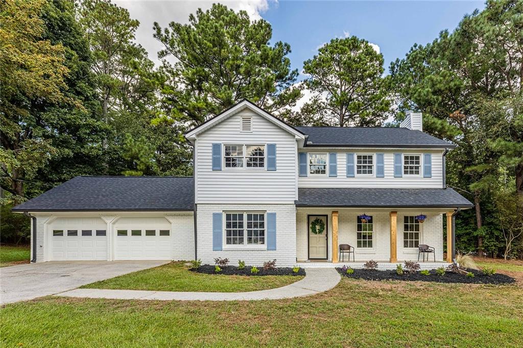 Beautiful renovation on a level lot in top East Cobb school with low taxes! This home feels like new with over $125k in renovations! Owner opened floorplan, expanded the master bath and powder room, added a completely new kitchen including cabinets, counters, appliances, baths, roof, water heater, A/C unit, lighting, flooring painting and much more! **Preferred lender will pay up to $6,000 towards closing costs or rate buydown!