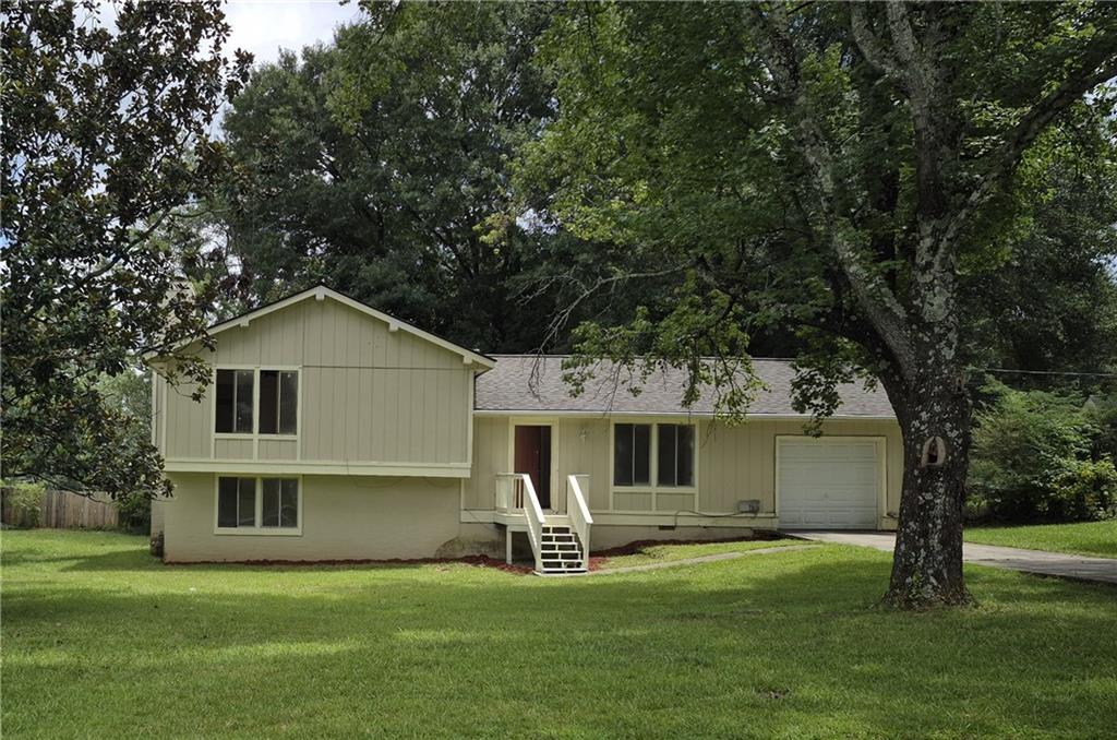 Investor Special! This is easily the best deal on the market in Lawrenceville, check the comps! This home features 4 bedrooms, 2 bathrooms, and a finished basement. You will love the finished basement which features a large den area with a fireplace and one of the bedrooms. You will also love the nice level lot and newer roof! Whether you are looking to renovate and flip or simply build long term equity, this is the one you have been looking for. It is cleaned out, painted, and ready for you to bring this diamond in the rough back to life!