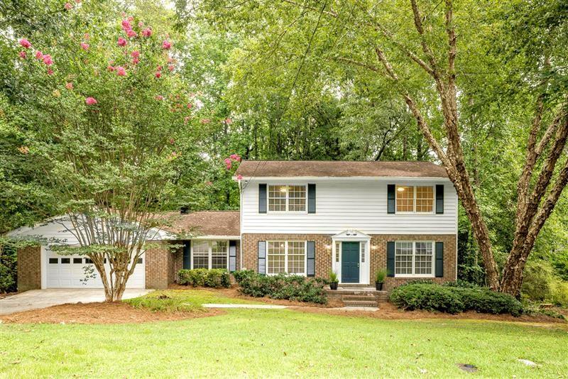 FABULOUS HOME & LOCATION! Quiet cul-de-sac in the sought-after Dunwoody Elementary is move-in ready and the perfect blend of charm, convenience, and space. Just a short walk to schools, places of worship, and the JCC, it’s ideally situated! Freshly painted inside and out, the home features beautiful hardwood floors on both levels. The main floor offers a large living/flex room, a bedroom with full bath, and a spacious fireside great room with front-to-back windows that fill the space with natural light. The newly upgraded kitchen has brand-new granite countertops, a new oven and dishwasher, and freshly painted cabinetry. Upstairs, you’ll find a generous primary suite/bath, plus two additional bedrooms and full bath. Enjoy outdoor living on the newly stained deck overlooking a private, fenced backyard—perfect for play, pets, or gatherings. The daylight basement offers high ceilings and plenty of room for a gym, play area, or future finished space. An incredible value in one of Dunwoody’s most convenient and desirable neighborhoods!