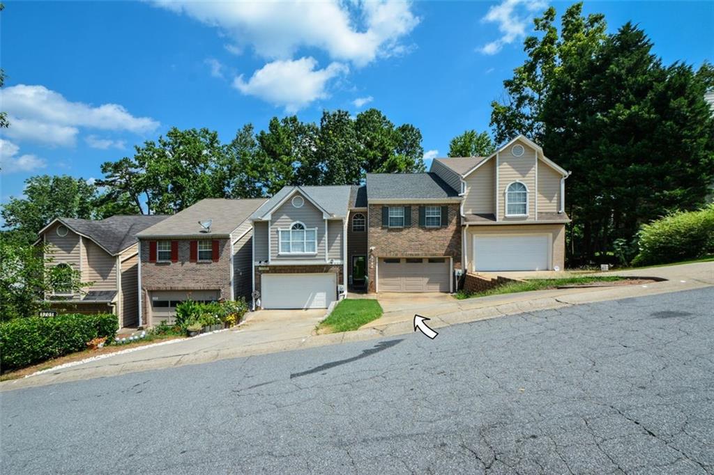 1703 Grist Mill Dr. is waiting for you! This spacious 3 bedroom, 2.5 bathroom Townhouse is located in the heart of East Cobb with easy and quick access to I-75. Your home is ideal for cozy family living and entertaining family and friends. As you enter the front door and pass through the expansive foyer, you enter a 2-story family room with a gas fireplace, an open kitchen with bar seating and a view of the family room. After you have prepared your meals in your conveniently located kitchen with a full appliance package, enjoy your breakfast, lunch and dinner in your separate dining room that flows to a cozy deck. The loft/landing upstairs is perfect for your home office and leads to a laundry room and two roommate suites with garden tubs and separate showers. You will delight family and friends in your spacious finished terrace level which is perfect for a media room with a closet or a third bedroom with separate entrance and extra unfinished space ideal for a fitness center and additional storage. DO NOT PROCRASTINATE AS YOUR HOME IS PRICED TO SELL!