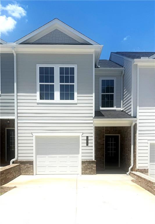 Welcome to Chimney Oaks Golf Course Community. Our Nicole floor plan is a 3-bedroom, 2.5 bathrooms townhome and has an open floor concept on the main floor with all bedrooms located on 2nd floor. The kitchen features white cabinets, granite countertops, pendant lighting, electric range and stainless-steel appliances. Directly looking into the family room enjoy a cozy linear fireplace with tile surround. LVP flooring on the entire 1st floor is also included. The master bedroom has a spacious walk-in closet with a comfortable master bathroom featuring separate tiled shower/tub with double vanity. Come and enjoy all the amenities this community offers!!! Golf course, Jr Olympic sized pool, tennis courts, pickleball, fitness center, and clubhouse with a conference room and restaurant. This home is move in ready! Bring your motivated buyers. ***Ask the onsite agent about our generous incentives when using our preferred lenders***Interior Stock photos being used***