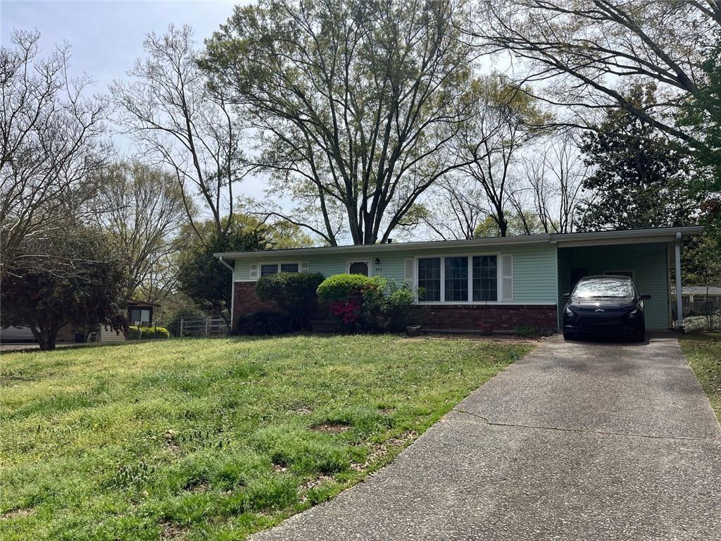 Cozy Pet-Friendly Smyrna Bungalow for Lease – Prime Location!
Welcome to this charming 2-bedroom, 1-bath home offering worry-free living in a prime Smyrna location. Easy access to The Battery Atlanta, downtown Smyrna, Wellstar Hospital, local farmers markets, and county parks.
Original wood flooring in the breakfast room, dining/living area, and both bedrooms. A quiet bonus room provides ideal space for a home office, playroom, or extra storage.
Enjoy a fully fenced, level backyard—great for pets, entertaining, or planting your own vegetable and herb garden. A covered carport and low-maintenance yard add convenience.
Zoned for Norton Park Elementary, Belmont Hills Middle, and Campbell High School, and located near the Cobb Innovation & Technology Academy (CITA)—a countywide magnet program offering unique career and tech-focused education (application required).
This pet-friendly rental is available with flexible lease terms, including options up to 36 months—perfect for families, professionals, or anyone seeking comfort and flexibility in a desirable Smyrna neighborhood. Call for easy appointment to tour this home!
