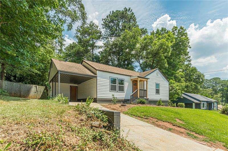 This charming home has been completely renovated. Large open concept with SS appliances and a lovely white kitchen and stylish fixtures. Owner's suite has a large walk in closet, stunning spa like bathroom with two head shower. There are two additional bedrooms, one of which has it's own private bathroom perfect for guests or In-laws. The third bedroom shares the equally beautiful third bathroom. This home also features a big flat backyard perfect for entertaining! Come see this beauty!