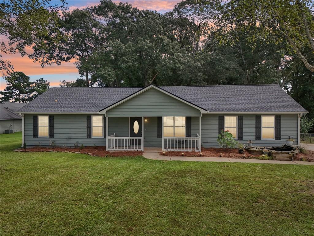 Welcome to this one level, home! This charming 3-bedroom ranch, situated in a quiet community and cul-de-sac lot, offers privacy and no HOA restrictions. The spacious, fenced backyard is perfect for entertaining, pets, or relaxing in the outdoors, and is over .6 acres. Inside, the bright, open kitchen flows into a cozy living room with a fireplace- a very inviting and functional layout. Master suite on main with attached bath. The two additional bedrooms offer flexible space, perfect for a home office, studio, or extra room for family and guests. With a newer roof, ample parking, including a two-car garage, and a long driveway, you'll have plenty of space for visitors. Plus, a backyard shed. Tons of recent updates including roof, paint, flooring, fixtures, counter tops, appliances, HVAC, and much more. Located within walking distance to Newton High and Clements Middle School, and with easy access to I-20, this home is the ideal combination of comfort, charm, and convenience-perfect for first-time buyers!
