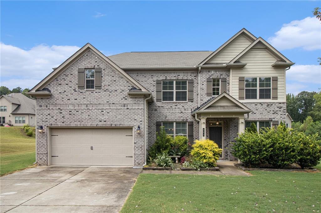 This stunning home offers a fabulous open-concept floor plan designed for both easy living and entertaining. Off the welcoming foyer, you’ll find a formal dining room with hardwood floors and a butler’s pantry, while a versatile flex space on the opposite side is perfect for a home office. The main level also includes a guest bedroom with a full bath.
The gourmet kitchen is a chef’s dream, featuring stainless steel appliances, double ovens, granite countertops, a large center island with breakfast bar, and stylish pendant lighting. It flows seamlessly into the spacious fireside family room, with hardwood floors throughout the main living areas.
Upstairs, the oversized owner’s suite offers a luxurious retreat with a spa-like bath and expansive walk-in closet. Three additional bedrooms, two full bathrooms, and a convenient laundry room complete the upper level.
Enjoy outdoor living on the extended back patio, perfect for relaxing or entertaining. Located in sought-after school districts and close to shopping, dining, and entertainment, this home truly has it all!