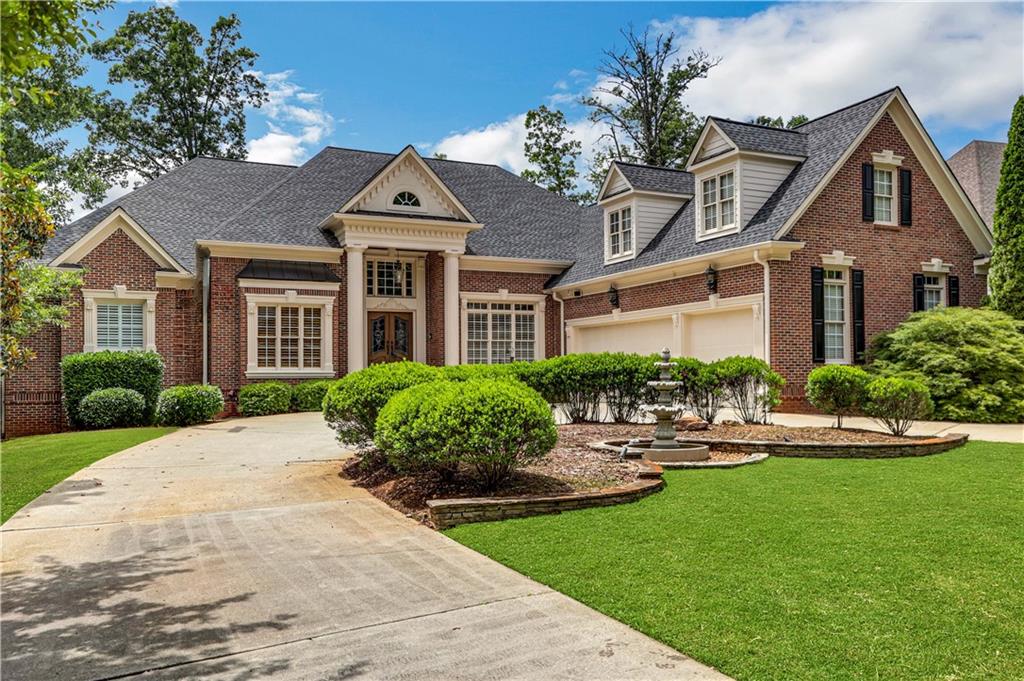 Welcome to this exquisite four-sided brick ranch nestled in the prestigious Polo Golf and Country Club. Prepare to be captivated by the elegance and grandeur that awaits you within these walls.

As you step through the magnificent two-story foyer, adorned with intricate moldings and resplendent hardwood floors, you'll instantly feel the aura of sophistication. The foyer gracefully leads you to a formal banquet-sized dining room, perfect for hosting lavish soirées. Adjacent to the dining room, a study awaits, featuring French doors and a coffered ceiling, offering a tranquil space for work or relaxation.

The open floor plan seamlessly connects the great room, where soaring ceilings adorned with coffered moldings create a sense of grandeur. White built-in bookcases and a stack stone fireplace add a touch of elegance, providing the ideal ambiance for cozy evenings. 

The gourmet kitchen is a chef's dream, boasting maple cabinetry, sleek granite countertops, and a separate island. The breakfast bar and built-in desk add convenience, while the vaulted ceiling in the breakfast area bathes the space in natural light. From the kitchen, great room, or the opulent master suite, you can access the main level screen porch, overlooking the pool and manicured backyard—a haven for relaxation and entertainment.

The primary suite exudes luxury, featuring a spacious sitting area adorned with a gas log fireplace, creating a serene retreat within your own home. The fully renovated primary bathroom showcases exquisite marble flooring, an oversized marble-tiled shower, a luxurious soaking tub, and separate his and her vanities.

Venture downstairs to discover an entertainer's paradise. The expansive family room boasts a gas log fireplace, while the game room is large enough to accommodate a variety of recreational activities, from billiards to shuffleboard and even foosball. Treat your guests to refreshments from the wet bar, designed to impress.

Entertainment options abound with an in-home theater and a bunk room, providing endless fun and relaxation. Ample storage and a fitness room cater to your every need, ensuring a well-rounded lifestyle.

Step outside to embrace the beauty of the Georgia seasons. An underground Gunite pool and spa, along with a sunning deck, invite you to unwind in style. The spacious grassy area is perfect for outdoor games like cornhole or a playset, while the Polo Golf and Country Club, nestled within the community, offers exclusive access to exceptional amenities through a separate private membership.

With its ideal location near top-notch schools and meticulously maintained homes, the Polo Golf and Country Club stands as one of the most desirable communities in North Atlanta. Don't miss the opportunity to call this luxurious residence your home—a perfect blend of elegance, comfort, and sophistication.