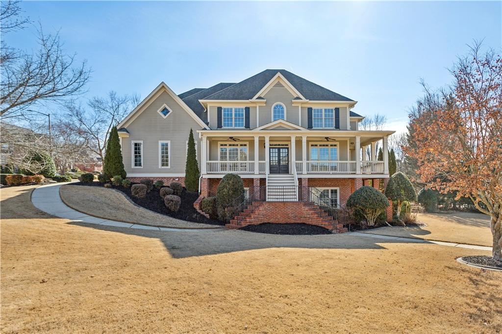 Welcome to 1078 Meadow Brook Dr, a charming and spacious home nestled in the heart of Woodstock and the sought after Meadow Brook neighborhood! This stunning property offers a perfect blend of comfort, style, and convenience. With its well-maintained interior and inviting curb appeal, this home is sure to impress. Step inside to discover a thoughtfully designed layout 5 bedrooms and 4.5 bathrooms, an open-concept living and dining area, and a beautifully updated kitchen that is perfect for entertaining. The spacious master suite offers a peaceful retreat with ample closet space and a luxurious en-suite bathroom. Don't miss the large finished basement with a bedroom/bathroom, multiple entertaining rooms and large built in bar. Also a large unfinished room for storage Outside, enjoy the serene backyard with a large deck overlooking the fenced in yard, ideal for relaxing or hosting gatherings. New to this home is freshly sanded and stained hardwood floors on the main level and hall upstairs. Freshly painted first and second floor, new quartz in the kitchen, a new microwave, resurfaced kitchen and primary bedroom cabinets, new carpet just to name a few things you will love at this home. Don't miss the opportunity to make 1078 Meadow Brook Dr your new home. Schedule a showing today and experience all this wonderful property has to offer!