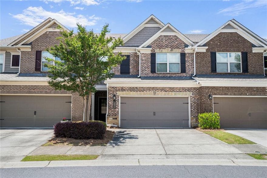 Beautiful Townhome in Prime Location – Top Schools, Walk to Shops & Dining!

Welcome to this stunning 3-bedroom, 2.5-bath townhome, perfectly situated in one of the most sought-after neighborhoods! Located right behind a prestigious swim school and just steps away from a major shopping center, restaurants, and top-rated schools—this home offers unbeatable convenience and lifestyle.

Step inside to a warm and inviting main level featuring gleaming hardwood floors throughout the foyer, dining area, and living space. The open-concept design is perfect for entertaining, with a cozy fireplace and a rear porch ideal for outdoor gatherings.

The gourmet kitchen is a chef’s dream, complete with a large island, granite countertops, 42" cabinets, and stainless steel appliances. Enjoy casual meals at the island or host dinner parties in the spacious dining area.

Upstairs, retreat to an oversized master suite with a luxurious bath featuring a separate shower and soaking tub. Two additional generously sized bedrooms provide plenty of space for family, guests, or a home office.

Other highlights include:

Easy-maintenance living
Prime location within walking distance to shops, restaurants, and parks
Top-ranked school district—perfect for families or couples looking to invest in education
This home combines comfort, style, and location in one perfect package. Don’t miss the opportunity to make it yours!