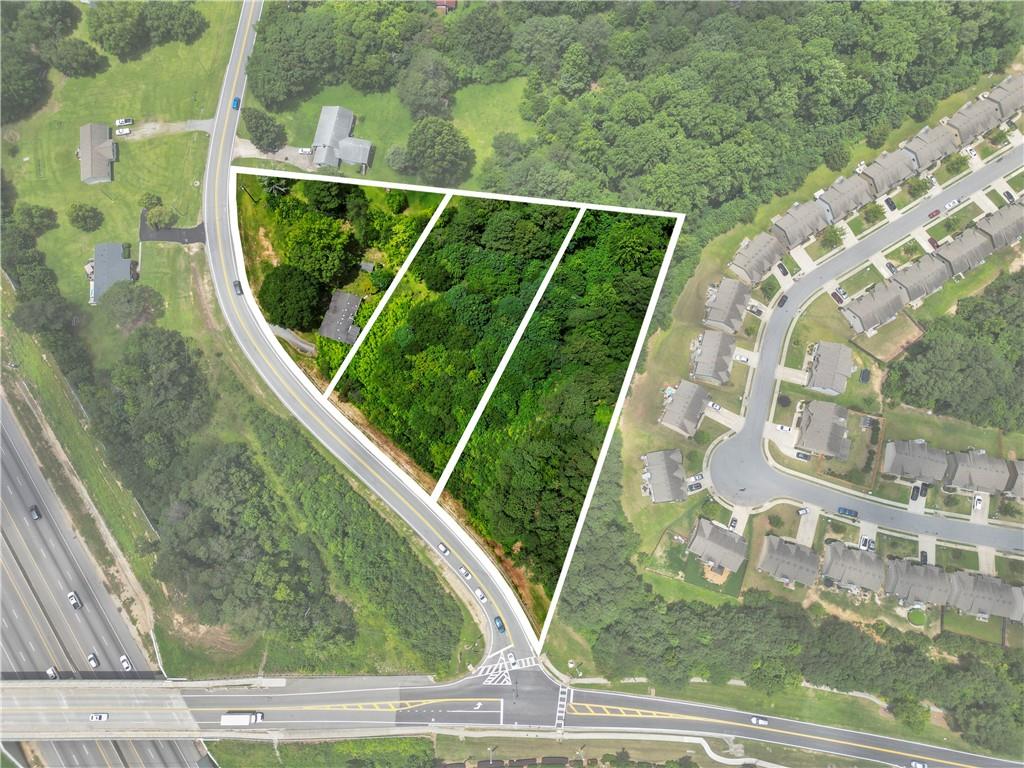 Exceptional opportunity in Buford’s sought-after Seckinger Cluster. Zoned R-100 and ready for immediate development, this property supports three single-family homes with sewer access at the rear. Ideal for builders or buyers looking to create a private estate. Just minutes from I-85, Mall of Georgia, parks, and top schools. Surrounded by new construction and 2 million-dollar homes. Served by Ivy Creek Elementary, Jones Middle, and Seckinger High (Georgia’s first AI-themed high school with STEM, arts, and tech-focused programs). Rare to find shovel-ready land in a premium school district with strong resale demand. Existing home has no value and will need to be demolished. Seller is a developer and can assist with the building process. Open to creative deal structures.