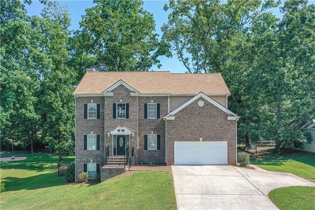Photo 1 of 54 — 220 Brookwood Drive, Carrollton, GA 30117