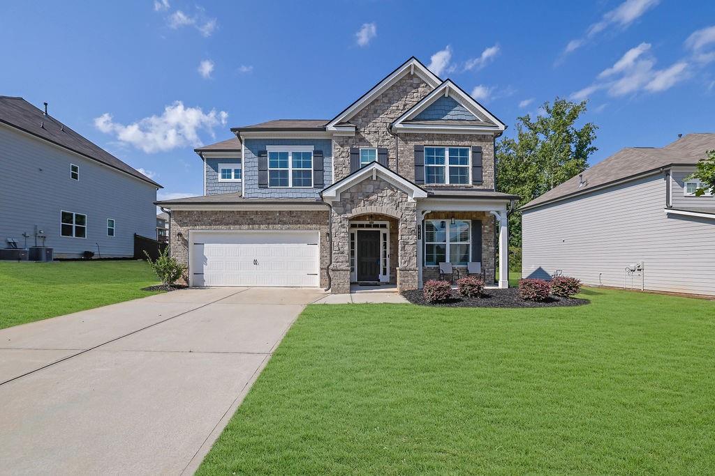 Beautiful 5-Bedroom, 4-Bath Home with Luxury Finishes!
This stunning home is loaded with features, including a central vacuum system, a covered back patio with fireplace, and a chef-style built-in stovetop paired with a farmhouse range hood.
Step inside to find hardwood floors throughout and a formal dining room that leads to the gorgeous kitchen overlooking the family room. The kitchen boasts high-end stainless-steel appliances, granite countertops, 42-inch cabinets, a breakfast room, and so much more!
A main-level bedroom with a full bath is perfect for guests or in-laws. Upstairs, the **HUGE** owner’s suite offers a sitting area and plenty of space for your California king bed. The spa-like owner’s bath features tile flooring, two massive walk-in closets, dual vanities, and oversized his-and-hers tiled showers. This home truly has it all!