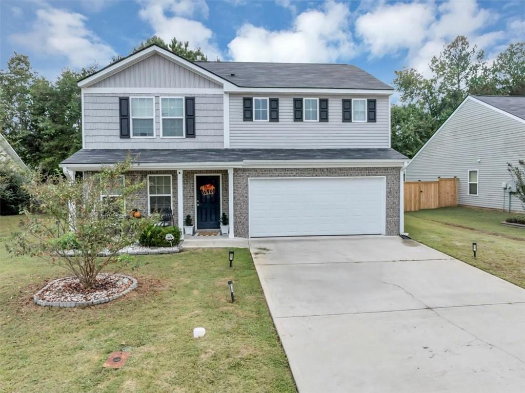 Welcome to Walton Creek! This beautiful 4 bedroom, 3 bath home is filled with charm and modern comfort. Enjoy relaxing on the inviting front porch before stepping inside to a bright, open-concept main level designed for today’s lifestyle. The spacious kitchen features white cabinets, solid surface countertops, stainless steel appliances, and LPV flooring that flows seamlessly throughout the main floor. The main level also features a bedroom for added convenience and full bath with solid surface countertops. Upstairs, you’ll find an open loft area, an oversized primary suite with a spa-like bathroom, a large walk-in closet, and spacious secondary bedrooms. Outside, the private backyard is perfect for entertaining and includes a cozy fire pit. Move-in ready and located in a well established neighborhood with NO HOA and just minutes from shopping and dining. This Walton Creek gem is one you don’t want to miss!