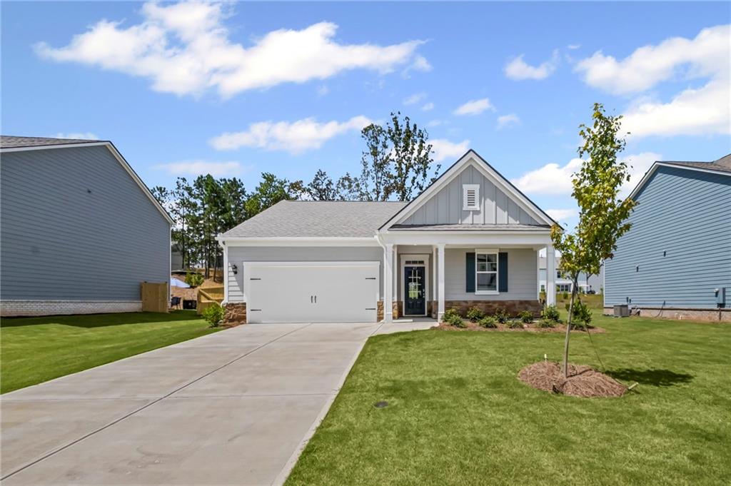 Welcomes you to 65 Grove Springs Court, a new construction single-family home in Parkside at Carter Grove
community. This Cali, 4 bedroom and 2 bathroom ranch floor plan home, has a lot to offer your family in the 1,774 square feet. Your family
can enjoy spending time outside in the large, flat backyard. A long foyer leading to the main living area and bedrooms welcomes you as
you enter this home from the front porch. At the front of the home, 2 secondary bedrooms are split by the guest bathroom. Each bedroom
boasts a walk-in closet, including the 3rd bedroom that is the perfect size for an office space or guest bedroom. The laundry room sits right
outside of this room providing easy access for all to do laundry. Continuing deeper into the home, you walk into the open concept kitchen
and living area. The chef in the family will enjoy all the kitchen has to offer including, stainless-steel appliances, granite countertops, white
shaker cabinets, and a large walk-in pantry. An oversized island separates the kitchen from the dining area. Enjoy spending time with
family and friends in the spacious living room or outside on the covered back patio. The primary suite is tucked away to the back of the
house, off of the living room, providing privacy homeowners can use to relax and unwind. The primary suite comes with a considerable
walk-in closet, dual vanity, and separate walk-in shower and soaking tub.