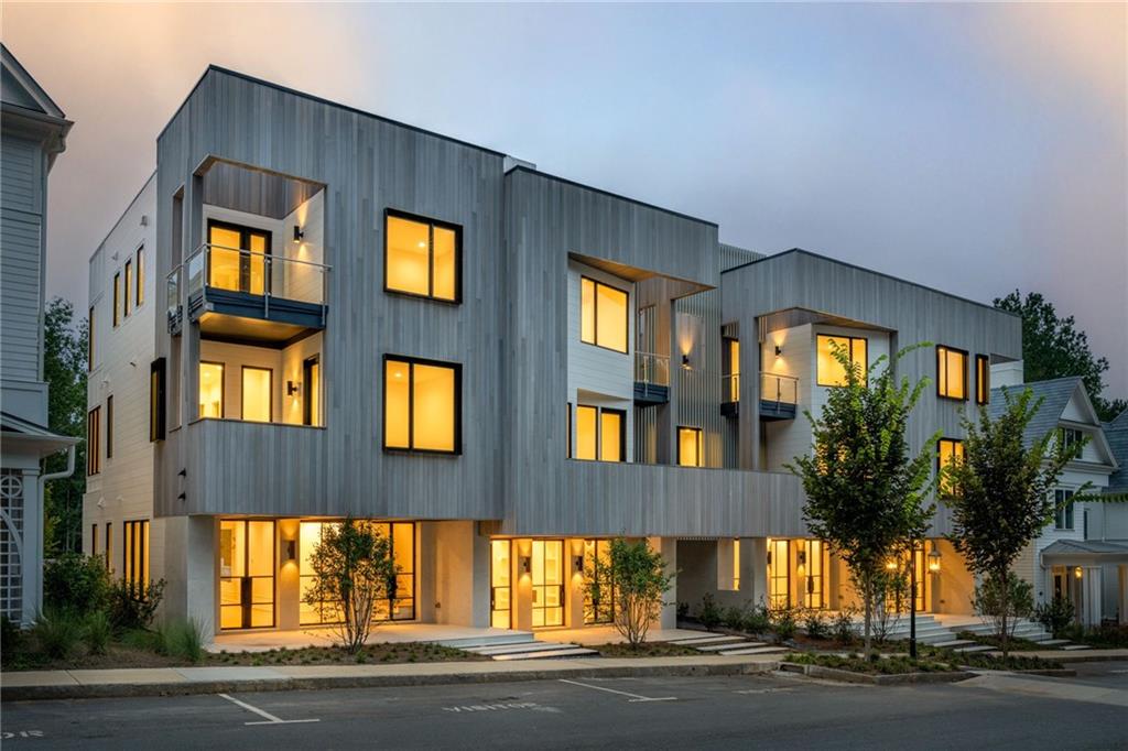 Nestled in the Overlook Hamlet of Serenbe, these modern townhomes epitomize luxury and comfort with their thoughtfully designed open floor plans. The living and dining areas seamlessly blend to create a spacious and inviting atmosphere, ideal for both everyday living and entertaining. Each townhome boasts a charming front porch, perfect for relaxing and enjoying the serene surroundings. The primary suite, located on the second level, offers a private balcony, providing a tranquil retreat with stunning views. Additionally, two versatile flex rooms with their own balcony overlooks the treetops, offering a peaceful space for a home office, studio, or additional lounging area. The townhomes also feature en-suite bathrooms for each of the three guest bedrooms, located on the third floor, ensuring privacy and convenience for guests alike. This home also includes an added-in elevator, convenient for every day living. Overlook is Serenbe's newest pocket neighborhood, featuring immediate access to over 20 miles of soft surfaced nature trails with protected forest views + a short distance to every Serenbe wellness amenity.
?
DISCLAIMER: Some photos in this listing have been virtually staged or digitally rendered to illustrate the potential of the home's interior and exterior spaces. These images are for visualization purposes only and may not reflect the property's current condition or features.