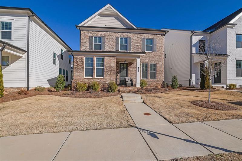 Experience premier amenities, including gated entrances, scenic walking trails, a sparkling pool, tennis courts, and a playground. This community buzzes with energy, from kids enjoying the playground to neighbors gathering in lush green spaces. Pet owners will love the dog-friendly sidewalks and private trail, perfect for leisurely strolls. Ideally situated just 2 miles from Halcyon, 4 miles from Avalon and downtown Alpharetta, with a new GA 400 exit on the way. Served by top-rated Forsyth schools, this vibrant, connected community awaits you.