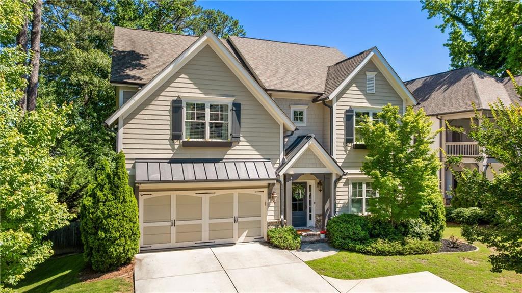 Discover your dream home in the sought-after Ashford Park elementary district! This stunning newer construction boasts a full finished basement, perfect for extra living space or entertainment. The massive level backyard is a rare find. Enjoy the outdoors on the covered and screened-in rear porch or the expansive deck area. Inside, you'll love the spacious 5-bedroom, 4-bathroom layout, complete with a convenient half bath on the main level. The laundry room is thoughtfully located upstairs, just steps from the bedrooms. The primary suite is a retreat in itself, featuring separate vanities, a soaking tub, and a walk-in shower, plus two spacious walk-in closets. Convenience is key in this location, with easy access to Dresden Village, MARTA, downtown Chamblee, Town Brookhaven, and a plethora of shopping, grocery, bars, and restaurants. The main level is beautifully appointed with hardwoods throughout, adding warmth and elegance to the space.