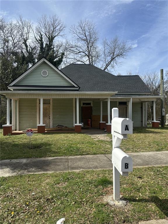 Looking for an investment property? Here it is! Once renovations are complete, this property can be a great source of income or live in one side and rent the other side out. Each unit is a 2/1 with both bedrooms being upstairs. It has a new roof and foundation repairs already completed. Nice size lot as well. All construction items stay with the property.
