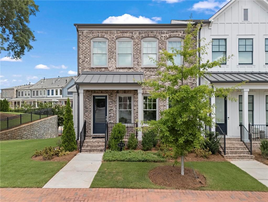 Welcome to this beautifully designed 3-level townhome, built in 2022, featuring 3 bedrooms, 3.5 baths, and stylish upgrades throughout—including brand new hardwood floors and custom light fixtures. Just moments from downtown Roswell, enjoy easy access to shops, dining, parks, and the Roswell Junction food hall.
The main level features an open-concept layout with a gourmet kitchen-complete with a large quartz island and stainless steel appliances. The kitchen flows into a bright living room with a gas fireplace and a spacious dining area—ideal for entertaining. Enjoy the private balcony and a built-in office nook, perfect for remote work.
Upstairs, the primary suite offers a custom walk-in closet and a spa-like bath with dual vanities and a tiled walk-in shower. The lower level offers flexible space ideal for a home office, media room, or gym.
With luxury finishes, abundant natural light, and an unbeatable location—this Roswell gem has it all!