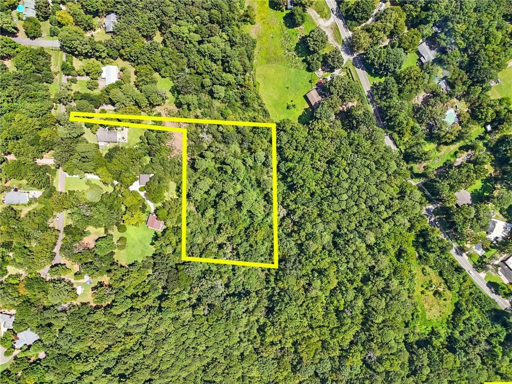 Discover 2.118 private acres just a short walk from beautiful Lake Allatoona! This property is ready for your builder to create your own private estate. Bordering Corp property on two sides, it offers peace and privacy while still being zoned AG with no HOA or covenants/restrictions. Located in a top Cherokee County school district and convenient to shopping and dining in every direction. A well is already in place—just bring your vision and start building!