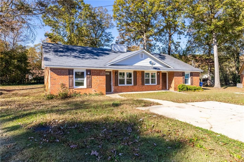 Excellent investment opportunity! This income-producing property features long-term tenants and a solid 4-sided brick building. Each spacious unit offers 2 bedrooms and 2 baths. With no HOA fees and strong cash flow, this property is a great addition to any portfolio. Please do not disturb tenants—. Conveniently located near Hwy 316 and downtown Lawrenceville, with easy access to hospitals, restaurants, schools, parks, and shopping.
