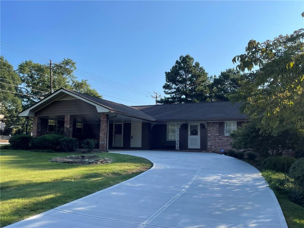 Newly Renovated 4-Sided Brick Executive Ranch Located In Prime Tucker Location. Minutes From I-285 And The City Of Tucker. Abundant Natural Light Throughout. This Spacious 3-Bedroom, 2-Bath Home Features A Brand-New Kitchen With Granite Countertops, Stainless Steel Appliances, And LVP Flooring In The Living Room, Family Room, Dining Room, And Laundry Room. Bathrooms Are Beautifully Updated With Modern Tile Finishes. Fresh Interior Paint, Hardwood Floors Throughout, And A Newly Paved Driveway Add To The Appeal. Enjoy A Large Front Yard And Backyard, Perfect For Outdoor Living. Conveniently Located Minutes From The New Tucker Meridian Shopping Mall, Northlake Mall, A Variety Of Dining Options, And Stone Mountain Park. Landscaping Is Included In Rent. No Pets Allowed.
