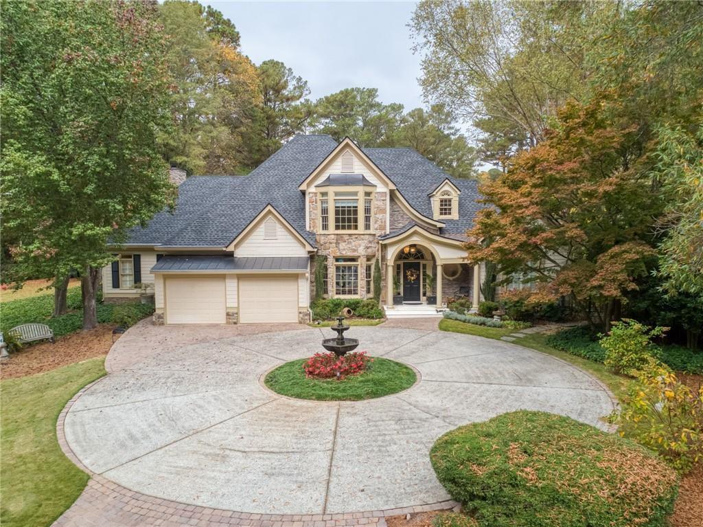 Comfortable Elegance in a Prime North Atlanta Location. Step into refined comfort at 125 Claridge Drive, where thoughtful design meets everyday comfort. Tucked away in a quiet cul-de-sac of just four homes, this beautifully updated residence blends classic design with modern functionality. With main-floor living, a spacious owner’s suite, and plenty of room upstairs for guests, kids, or in-laws, the home adapts easily to any lifestyle. Whether you're hosting for the holidays or unwinding by the fire, you'll appreciate the timeless finishes and thoughtful updates throughout. And if you don’t need all the space just yet? Energy-efficient spray foam insulation ensures your comfort without compromise.
Highlights:
• Main-Level Living: Spacious owner’s suite with dual closets, fireplace, and a serene en-suite bath (recently updated!)
• Upstairs Retreat: Flexible space for kids, guests, or in-laws with efficiency-minded insulation, (two bathrooms recently updated!)
• Chef’s Kitchen: Miele appliances, gas cooktop, custom cabinetry, and a 150-bottle Viking wine fridge in a separate
• Outdoor Living: Covered patio with limestone tile, gas grill + cooktop, stone fireplace, and custom lighting
• Architectural Touches: Dramatic dome ceiling, custom cabinetry, built-in bookcases, and designer lighting
• Warm Comfort: Two gas fireplaces are located throughout the home, and another one outside
• Recent Upgrades:
o 2024 architectural roof
o Two 2024 A/C units
o All bathrooms have been recently renovated with quartz, marble, and stone
o High-efficiency attic insulation
o Fresh interior and exterior paint
• Bonus Features: Epoxy-sealed garage with extra storage, included Miele washer/dryer, and garage refrigerator
• Exceptional Location: Brookhaven/Buckhead/Sandy Springs convenience with a lower tax base
This home is more than just beautiful—it’s livable, practical, and welcoming. Come see for yourself!