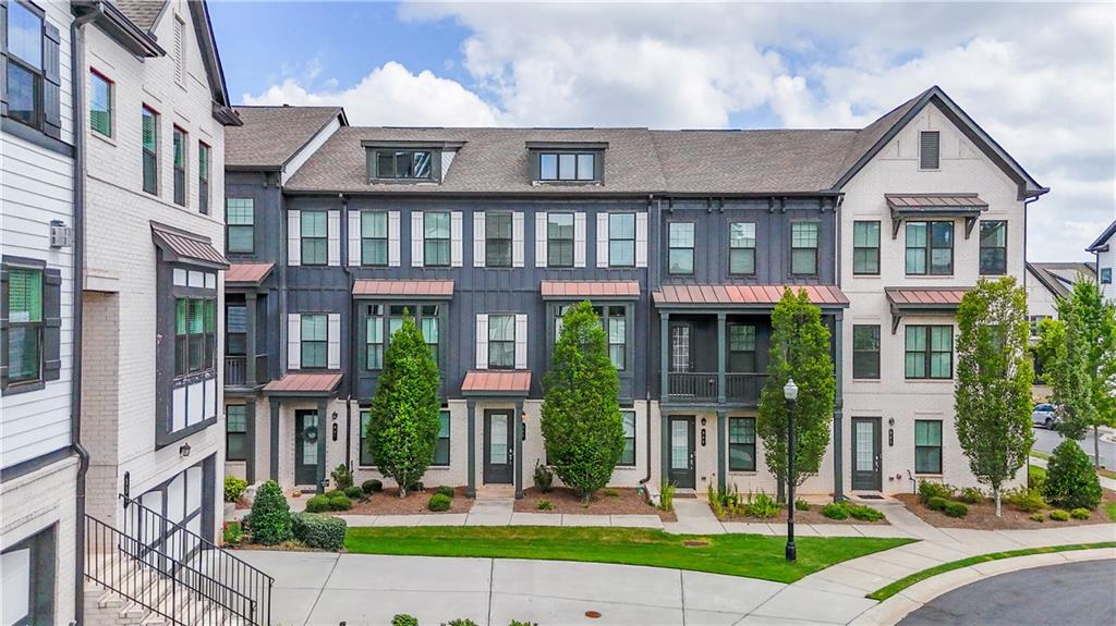 Welcome to your dream home in the heart of Alpharetta! This beautifully designed 3-bedroom, 3.5-bath townhome is located in the highly sought-after Caravelle at Windward Park community, offering upscale living, modern convenience, and an unbeatable location.The main level boasts an abundance of natural light and soaring 10-foot ceilings, creating an open and inviting atmosphere. The gourmet kitchen features professional-grade stainless steel appliances with double ovens, quartz countertops, 42-inch painted cabinetry, and a stylish butler’s pantry. Seamlessly connected are the spacious dining room—large enough to seat 12+—and the cozy living room complete with a gas fireplace. Additional upgrades throughout include: Wide-plank 7” luxury vinyl flooring.Quartz countertops in all bathrooms Oversized deck ideal for outdoor entertaining.Enjoy a low-maintenance lifestyle with access to premium community amenities, including a resort-style pool, clubhouse, and ample green space for kids and pets.
Perfectly located in the Windward area, this home is just minutes from Avalon, Downtown Alpharetta, and the Alphaloop. Commuters will love the walkability to Windward Park & Ride and the close proximity (under 1 mile!) to GA-400.Don’t miss this exceptional opportunity to own in one of Southern Living’s “Best Places to Live.” Schedule your tour today!