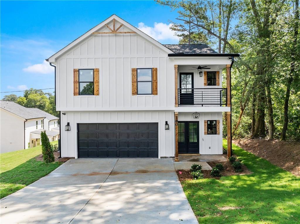 USDA ELIGIBLE, Discover this stunning 4-bedroom, 2.5-bath home steps from downtown Clarkesville and across from the historic courthouse. Enjoy mountain views, custom finishes, and a chef’s kitchen with a pot-filler and custom cabinetry. Outdoor spaces include a tiled balcony with panoramic views, a private back porch, and an irrigated, landscaped yard. With its prime location and thoughtful design, this home is a rare Clarkesville gem.