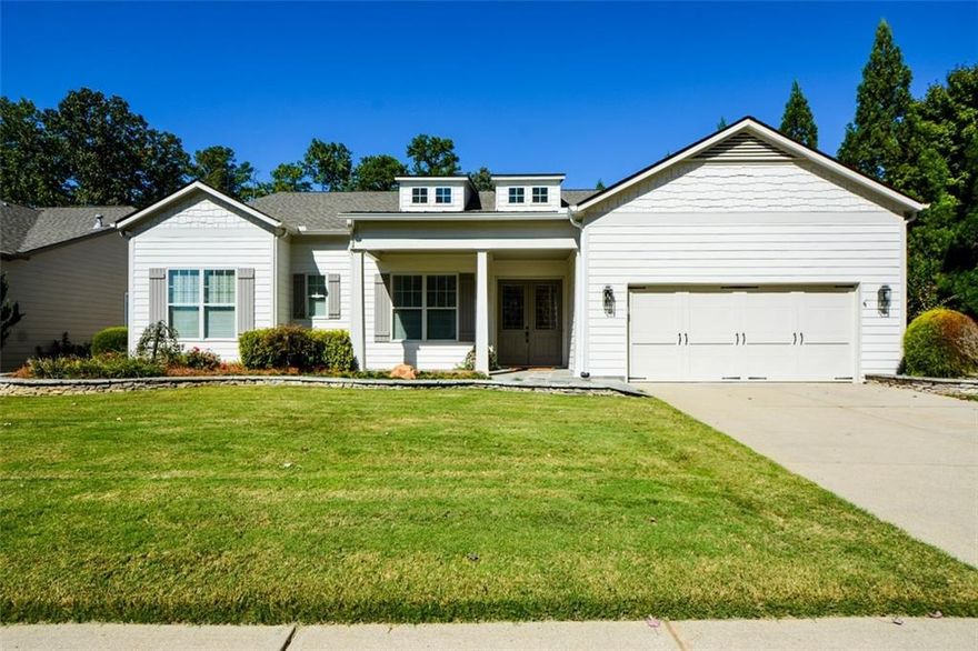 Welcome home to this beautiful stepless ranch home with a rocking chair front porch in Soleil Laurel Canyon, a security-gated 55+ neighborhood.  Located on a private "eyebrow" street, this home has outstanding curb appeal and backs to the golf course. It is conveniently located across the street from the clubhouse and all amenities. Recent updates include a newer roof and HVAC system, a fenced backyard with beautiful landscaping that includes a stone patio and wall, updated interior and exterior paint colors, new Curry & Company light fixtures, new built-in bookshelves & cabinetry on both sides of the fireplace and a new microwave.  The home features 8-foot doors and wood flooring throughout. The elegant primary suite has two spacious walk-in closets with a luxurious master bathroom that features two toilets (his & hers), two separate vanities (his & hers), a tub and walk-in shower that can be accessed from either vanity side. There are also two bedrooms on the other side of the home, each with its own ensuite bathroom.  This home also features a large living room and dining room, as well as a flex space currently used as a private office, a convenient laundry room with a utility sink and cabinetry. The gourmet kitchen features double ovens and a built-in pantry with pull-out shelving that opens to the breakfast area and large family room with a fireplace and several windows for natural light to flow through. Step outside the family room, and you will find yourself in your own private sunroom. This beautiful space features stone flooring, a television, and is climate-controlled with a mini-split heating and cooling system.  The windows also have screens allowing them to be opened during the Spring and Fall to enjoy the fresh air and pleasant temperatures during those times of the year. This is a stepless home, making it very easy to access the fully fenced backyard from the sunroom. Living in Soleil Laurel Canyon is a complete lifestyle. This active adult community features a 30,000+ square foot clubhouse with a ballroom, indoor and outdoor pools, a gym/aerobics studio, billiards, a card room, a library, and a theater, among other amenities. Outdoor activities offered include pickleball, tennis, bocce ball, greenhouse/gardening area, walking trails, and a fishing pier. There are several resident-led clubs with emphasis on fitness, gardening, bridge playing, bunco, cooking, wine socials, etc. Outside golf membership is optional.  HOA dues are $407 monthly ($4884/year) and include lawn maintenance, internet service, a 24-hour manned security gate, the community center, and full access to all amenities.