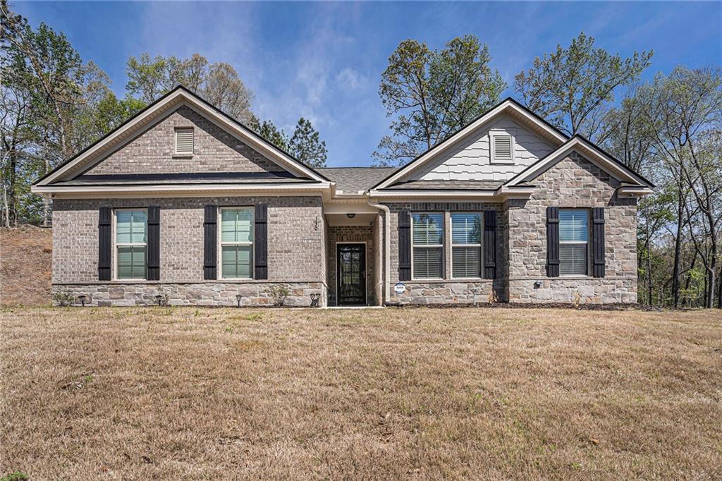 Welcome Home to this move in ready home!! This beautiful ranch style property features a Gourmet Kitchen which boasts an oversized island overlooking the breakfast bar and family area with an electric masonry fireplace. The kitchen also includes Stainless Steel appliances, Granite Countertops and Tile Backsplash with updated fixtures throughout. The Primary Bedroom is complete with Trey Ceiling and LVP Floor, Dual vanities with Granite Countertop, Oversized 5' tiled shower and a LARGE Walk-In closet in Primary Bathroom. This home is complete with a covered patio and ceiling fan, overlooking a private backyard for quiet family time. Tuxedo Estates is located in the sought-after Henry County School District, Home of the Top College Success Award Winners.