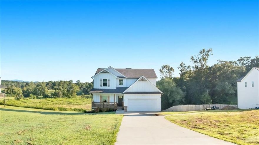 Discover unbeatable value in Habersham County with this modern 4 bedroom, 3.5 bathroom Craftsman home. Newer construction, it showcases thoughtful design with a spacious master on the main, multiple living areas on both levels, and two fireplaces—including a cozy outdoor fireplace ideal for relaxing or entertaining. The unfinished basement is already stubbed for a full bath, giving you room to grow. Set on a full acre with breathtaking mountain views and no HOA restrictions, this property offers the freedom to create your dream lifestyle—whether that means a pool, a garden, a workshop, or even a few chickens. All this, in a serene setting just minutes from town—this home is where elegance meets everyday comfort.