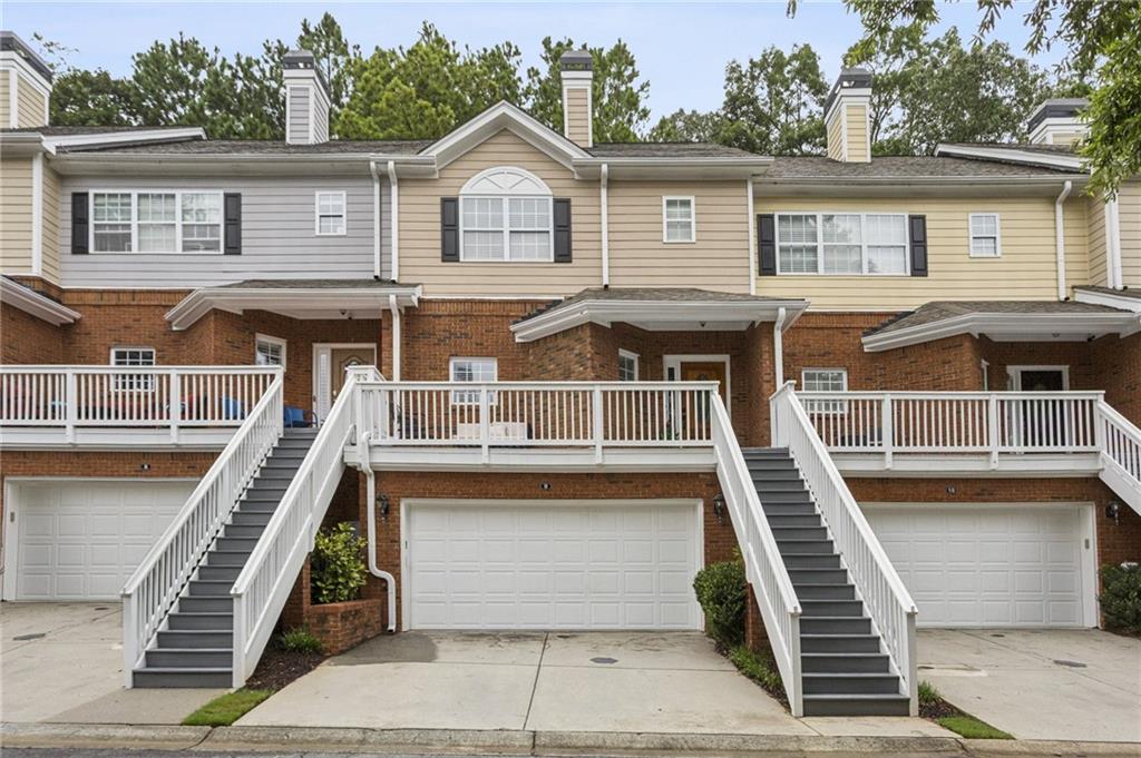 **6 MONTHS OF HOA FEES PAID BY SELLER WITH CONTRACT BY 9/15/25!!!!!** Welcome HOME to the most move-in ready, beautifully updated townhome in DREAM location in the heart of Alpharetta — minutes from favorite restaurants, shops, Roswell, Johns Creek, 400, and more!!! Prepare to be wowed from the moment you enter this light, bright, and airy townhome — with a rocking-chair front porch to greet you, outdoor relaxing & entertaining space abounds with ample room on front AND back decks! So much NEW…… FRESH interior paint throughout entire home, NEW LVP on main floor, NEWLY painted kitchen cabinets with NEW, on-trend hardware, ALL NEW kitchen appliances, TWO NEW HVACS… one just installed AUGUST 2025, and another one year old, custom accent walls, NEWLY RESEALED front patio with fresh epoxy, and so much more… nearly everything has been done for you, move right in and enjoy! Main floor features abundant natural light and bright, open floorplan that flows from eat-in kitchen to spacious yet cozy living room with plenty of room for office area or bonus sitting area, plus a fireplace!!! Private, quiet deck off living room is the perfect place to entertain or enjoy morning coffee. Upstairs features two spacious bedrooms, including oversized primary bedroom with HUGE WALK-IN CLOSET and generously-sized, luxurious primary bathroom with double vanity and separate tub/shower… lower level offers HUGE BONUS SPACE with endless opportunities…. The perfect home theatre, office, extra living/entertaining room, gym, or even a guest bedroom!!! TWO-CAR GARAGE!!!! Tucked away in a private, quiet enclave of home and minutes to all that Alpharetta and its surrounding communities have to offer!!! Don’t miss your chance to call this house HOME!