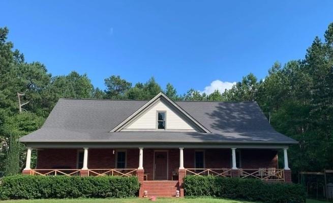 If Privacy is what you are looking for this is it! Enjoy your morning coffee on your front porch while watching deer! A Fantastic Opportunity to Buy, 4 sided brick Cape Cod on 5 Level Private Acres with a Master on Main! Features include Living room with shiplap fireplace, Huge country Kitchen with tons of Custom Cabinetry, Granite tops, Island, and Separate Dining room which Leads to a Private Deck. The Master on the main includes a jetted spa tub, seperate shower, and walk in closet! Guest Bedroom also on main is a bonus! 2 Massive Secondary Bedrooms on 2nd floor with private vanities and shared bath are perfect for any growing family. Not to mention a Loft space perfect for reading, office or activity area! Newly updated flooring and Paint just completed throughout the entire house. The Possiblities are limitless! This home will Not last and will NOT disappoint! Come check us out!