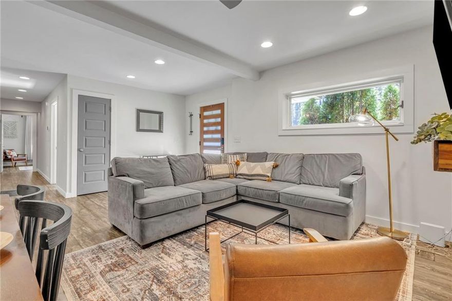 Welcome to 740 Custer Avenue, a beautifully updated home in Benteen Park—just south of Grant Park and only a mile from the BeltLine! This move-in ready brick ranch offers a perfect blend of modern upgrades and comfortable living and a flat, private backyard.

Step inside to an open-concept layout connecting the living, dining, and kitchen areas—perfect for entertaining or keeping everyone connected. The kitchen offers granite countertops, ample cabinetry, and direct access to the back deck, making it easy to unload groceries or host gatherings with friends and family. Out back, a spacious parking pad provides plenty of off-street parking for you and your guests.

Enjoy the outdoors in the spacious backyard—perfect for kids, pets, and weekend barbecues. Inside, you'll love the updated bathrooms, kitchen, and flooring (no carpet!), saving you the hassle of renovations.

The primary suite is a true retreat, featuring a walk-in closet and a spacious ensuite bath with double vanities and a luxurious waterfall shower. A large laundry room just off the main living area adds extra convenience. 

Perfectly positioned near some of Atlanta’s most beloved destinations, this home is just 5 minutes to Zoo Atlanta, 4 minutes to the BeltLine, and right next to Grant Park. You’ll also enjoy quick access to East Atlanta Village and a smooth commute to the airport—making this location truly unbeatable. Whether you're looking for a starter home or a smart investment in an up-and-coming neighborhood, 740 Custer is ready to welcome you home.