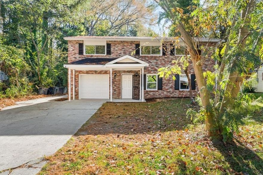 Welcome to this fully renovated all-brick home in the heart of the Historic Collier Heights District, where timeless charm meets modern design. This 5-bedroom, 3-bath home has been completely updated from top to bottom, featuring all-new framing, insulation, plumbing, electrical wiring, LED lighting, HVAC, and water heater—offering comfort, efficiency, and peace of mind for years to come.
Step inside to a bright, open-concept layout filled with natural light and modern finishes. The kitchen features white shaker cabinets with soft-close doors and drawers, quartz countertops, a stainless-steel dishwasher, a gas cooktop, and a range hood, complemented by a large breakfast bar that flows seamlessly into the dining and family areas.
Enjoy year-round comfort with central air conditioning, natural-gas heating, and ceiling fans throughout. Each bathroom was fully renovated with frameless glass shower doors, stylish vanities, illuminated mirrors, and updated fixtures, blending beauty and functionality in every detail.
The finished lower level adds flexibility with two bedrooms, a full bath, laundry area, and a private exterior entry—perfect for guests, extended family, or a home office.
Outside, the home sits on nearly half an acre of level, landscaped land, featuring a garage with a dedicated electric vehicle charging outlet and an extended driveway for additional parking. Inside the garage, there is also a bonus space at the rear, accessible through a separate back door, ideal for a home gym, workshop, or additional storage.
Conveniently located just 15 minutes from Midtown Atlanta and minutes from Westside Park, the BeltLine, and I-20, this move-in-ready home delivers the best of Collier Heights heritage with today’s modern comfort