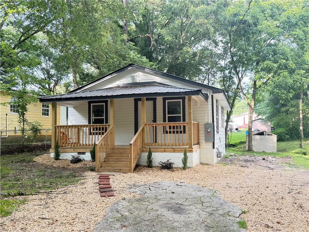 If you're looking for a great starter home, look no further! This just remodeled 2 Bed/1 BA Ranch home in the heart of Gainesville has all you need! Beautiful front porch. All new flooring, new kitchen cabinets and new appliances. All electrical has been replaced and new windows install throughout. Sunroom and/or Family room could easily be converted into a third small bedroom. Price hard to find. Dont miss this great opportunity!
