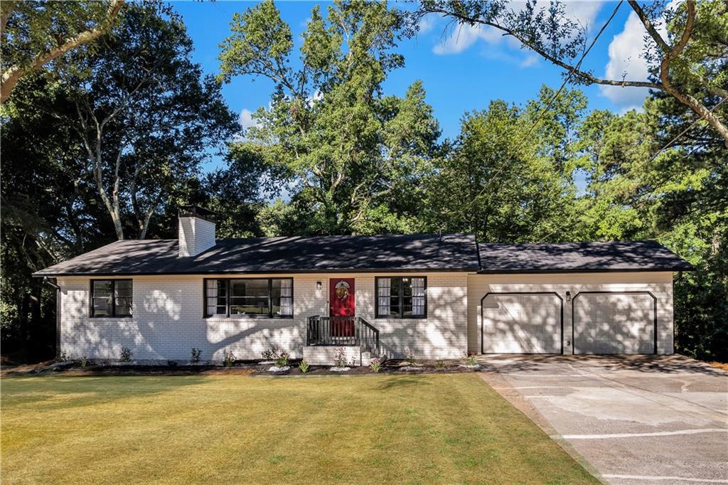 Fully Renovated Brick Ranch with Basement and Timeless Charm! Step into a beautifully updated 4-bedroom, 2-bath ranch home that blends modern upgrades with classic brick architecture. This move-in-ready property offers comfortable one-level living with the added bonus of a finished basement, providing space and flexibility for today’s lifestyle. The stunning kitchen features quartz countertops, new appliances, and stylish new fixtures—perfect for home chefs and entertainers alike. Both bathrooms have been thoughtfully renovated, including a brand-new tiled shower in the primary suite. Enjoy new flooring throughout the home, fresh interior and exterior paint, updated plumbing and lighting fixtures, and a new water heater for peace of mind. Cozy up by one of the two fireplaces, one on the main level and one in the spacious bonus room downstairs, ideal for a media room, playroom, or guest suite. The basement also includes generous space for storage or a workshop. With four well-sized bedrooms and a flexible layout, this home adapts to your lifestyle, whether you're working from home or hosting family and friends. Schedule your private tour today and experience all the comfort and convenience this home has to offer!