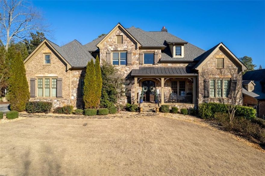 This executive stunner has everything you need! Murdock, Dodgen, and Walton school district! Two bedrooms on main: primary suite including fireplace, luxurious bathroom, and huge walk-in closet; spacious secondary bedroom with private entry. The gourmet granite kitchen will excite cooking enthusiasts - Bosch, Wolf, and Subzero appliances, warming drawer, pot filler. Kitchen opens to handsome keeping room with coffered ceiling and fireplace and two-story living room. Formal dining with butler’s pantry; gorgeous office on main level. Each upstairs bedroom features custom built-ins and bath. 4th floor perfect for workout space, media room, or playroom. Like to entertain? The walkout terrace level is simply gorgeous, with elegant double stone fireplace, 2nd kitchen with convection microwave, 12-person theater room (includes AV equip), wine cellar, bedroom, storage. Five fireplaces in all (including outside on balcony)! Level, fenced-in backyard for kids to play and is perfect for a pool. $10k in sod 2023. Fresh paint throughout; new carpet upstairs. Upscale garage flooring. Too many high-end upgrades to list!