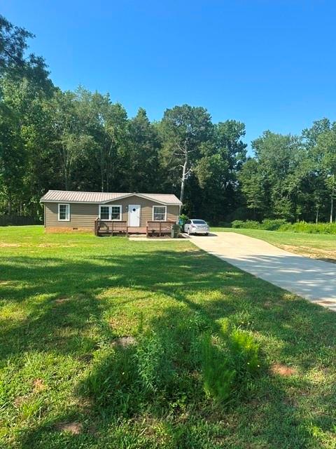 Discover incredible potential with this versatile A1-zoned property, perfectly positioned just 1 mile from the newly approved 24-hour QT gas station at the corner of Jot Em Down Rd and GA-400 in growing Forsyth County. With exciting development already on the horizon, this land offers strong future commercial possibilities. Home currently situate on the property comprised of 3 bedrooms and two bathrooms with a great open concept floorplan, family room and well equiped kitchen.
Whether you're a first time homebuyer looking for land, a builder looking to subdivide and develop multiple homes, or an investor seeking a turn-key rental property to add to your portfolio, this opportunity checks all the boxes. Nestled in a desirable and rapidly developing area, this property blends immediate functionality with long-term growth potential. Close proximity to the North GA Outlet Mall.
Don't miss your chance to invest in a piece of Forsyth County's future!