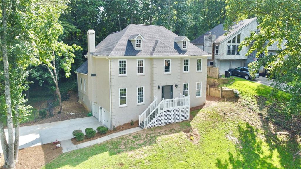 HIGHLY MOTIVATED SELLER. BEAUTIFUL COMPLETLY UPGRADED, NEW PAINT IN & OUT, NEW CARPET, NEW COUNTER TOPS, STAINLESS STEEL APPLIANCES, NEW LIGHT FIXTURES, NEW HARDWARES, NEW ROOF AND LOT MORE. HOME IN GREAT COBB LOCATION.HUGE MASTER WITH WALK-IN CLOSET. BEAUTIFUL INTERIOR, 4 BEDRROMS. 2.5 BATH, FORMAL LIVING, FORMAL DINNING, FAMILY ROOM WITH FIRE PLACE & BONUS ROOM WITH FIRE PLACE, PRIVATE DECK FOR SOCIAL GATHERINGS, FINISHED BASEMENT. SAFE/QUIET NEIGHBORHOOD. TOP SCHOOLS/WALK TO KENNESAW STATE UNIVERSITY. EASY COMMUTE TO WORK IN ANY DIRECTION! EASY ACCES TO MAJOR HWYS.CLOSE TO UPSCALE SHOPPING AND TOP RESTAURANTS. CLOSE TO LAKE ALLATOONA AND THE CAMP GROUNDS FOR ALL YEAR ROUND RECREATION. MINUTES FROM THE WALKING TRAILS AND FACILITIES OF KENNESAW MOUNTAIN NATIONAL PARK.