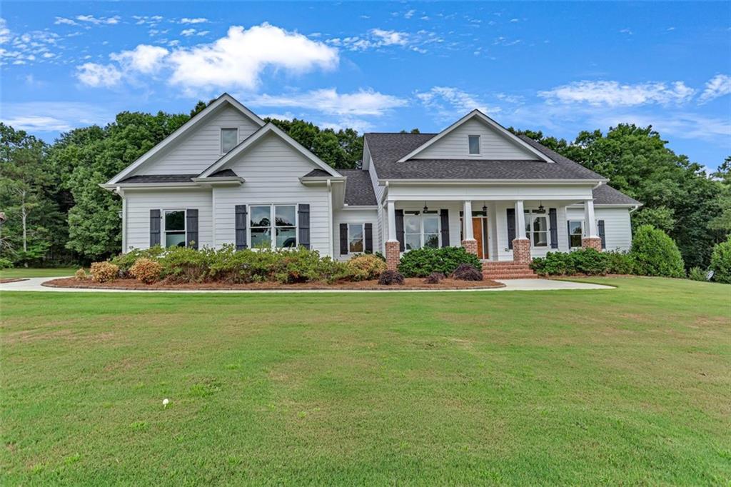 THIS ONE IS NOW ON THE MARKET! ENJOY A BEAUTIFUL CUSTOM RANCH WITH 10.0 AC LOT -A BIG RED BARN, AND A FENCED FRONT PASTURE ! A WELL WATER IRRIGATION FOR THE PASTURE , YARD & BARN IS A BLESSING! THIS MINI FARM IS READY FOR YOUR HORSES, GOATS AND CHICKENS AND WILL NOT DISAPPOINT! ! THE INTERIOR OF THE HOME WILL NOT DISAPPOINT EITHER BECAUSE IT HAS BEEN WELL TAKEN CARE OF AND SHOWS LIKE BRAND NEW ! A GRAND ENTRANCE INTO THE FOYER FROM THE COVERED FRONT PORCH SHOWCASES THE DINING ROOM AND LIVING/FLEX ROOM TO THE VAULTED FAMILY ROOM W/A RED BRICK FIREPLACE AND HIDDEN TV CABINET. THE CUSTOM PINE CABINETS, OVER-SIZED SOLID PINE DOORS AND PINE FLOORS SHOW BEAUTIFULLY THROUGH OUT THE HOME. THE ACCENT OF BRICK IN THE VLTD FAMILY ROOM, KITCHEN & BATHROOMS ARE STUNNING. THE OPEN KITCHEN HAS BLACK HONE GRANITE COUNTERTOPS, WALKIN PANTRY, DESK AREA, LOTS OF CABINETS, A FARM HOUSE SINK AND EAT IN BREAKFAST AREA PLUS ALL THE APPLIANCES ARE INCLUDED- EVEN THE SPEED QUEEN WASHER AND DRYER IN THE LAUNDRY ROOM. A WALKUP UNFINISHED ATTIC IS AVAILABLE ON THE MAIN LEVEL-NO PULL DOWNSTAIRS!! THE PRIMARY SUITE OFFERS DBL TREY CEILING, SITTING AREA, WALKIN CLOSET & CUSTOM ENSUITE HAS DOUBLE VANITY , LOTS OF CABINETS FOR STORAGE AND A SEPARATE WALKIN SHOWER & CLAW FOOT TUB. THE SPLIT BEDROOM PLAN HAS A BEDROOM WITH WALKIN CLOSET, AND ATTACHED BATHROOM WITH A LARGE SHOWER AND 3RD BEDROOM ON THE MAIN HAS AN ATTACHED HALL BATH WITH A SHOWER. THE NEWLY PAINTED DECK AND SCREEN PORCH IS LOCATED ON THE MAIN AS WELL. THE FINISHED BASEMENT OFFERS A HALF BATH, LARGE 4TH BEDROOM W/ATTACHED BATHROOM PLUS A LARGE RECREATION SPACE WITH POOL TABLE, THEATER ROOM, SEVERAL CLOSETS AND A SAFE/ STORAGE ROOM! THE SEPARATE WORKSHOP IS LOCATED IN THE BASEMENT TOO! A WALKOUT UNTO THE REAR PATIO AND BACK YARD IS A PLUS! JACUZZI HOT TUB WILL STAY! MORE UPGRADES AND FEATURES -TOO MANY TO LIST HERE BUT A LIST WILL BE PROVIDED. SO TRUE ABOUT LOCATION, LOCATION!! THIS HOME IS LOCATED OUTSIDE THE CITY LIMITS BUT CLOSE ENOUGH TO ENJOY THE DOWNTOWN RESTAURANTS, SHOPPING AND GREAT COMMUNITY EVENTS SUCH AS FESTIVAL, PARADES & CONCERTS ON THE TOWNE GREENE! THIS ONE WILL GO FAST! CALL TO SEE TODAY!