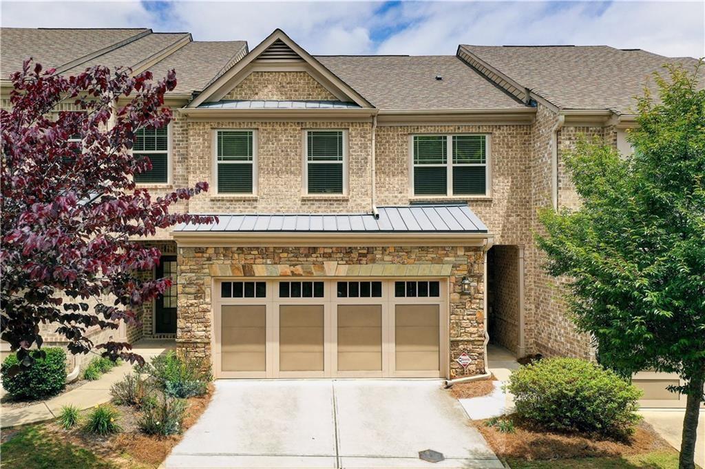 OPTIONAL SEMI FURNISHED HOME!!!
Welcome to Hidden Forest, a prestigious gated community offering a secure and tranquil living environment. High-end finishes and a thoughtfully designed floor plan, home. Located just minutes away from GA 400. This vibrant location offers an array of dining options and shopping destinations. Explore the nearby Halcyon and Avalon, both vibrant hubs for shopping, dining, and leisure activities. Step inside the luxurious brick townhome and discover an inviting loft space, perfect for either a productive workspace or a delightful play area for children. The main level features gleaming hardwood floors, granite countertops, and stainless steel appliances, elevating the kitchen to a culinary haven. The dining room provides an elegant space for gatherings, while the spacious family room with a fireplace sets the stage for cozy evenings. Step out onto the private PATIO, overlooking lush green spaces, and immerse yourself in the serenity of your surroundings. The fenced backyard offers a secluded oasis for relaxation, whether you want to unwind with a good book or allow your beloved pet to roam freely. Privacy is paramount in this community, ensuring a sense of tranquility and security. Take a refreshing dip in the community swimming pool or let your furry friend frolic in the dog park. Additionally, the convenience of a two-car garage, with no stairs to the main floor and hauling groceries up.