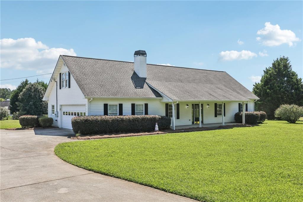 Welcome Home to this 3 Bedroom, 2 Bath Ranch with Huge Bonus Room upstairs stubbed for bath and floored so could be great for storage or to finish for an additional bedroom located in Good Hope, Georgia on 4 acres of land. No HOA!! Master Bath features jetted tub and separate shower. Enclosed glassed-in Sun Room on back of home to relax on quiet evenings. Large Country Kitchen features breakfast nook and dining area. Oversized laundry room with sink. Detached 2 car garage and shed in back yard. Plenty of room to Garden, raise farm animals, whatever you choose on your own Mini-Farm! Located just down the street from the Good Hope General Store, Dollar General and Good Hope Post Office, but still near plenty of shopping, dining and entertainment in Monroe. Enjoy the quiet of the country and away from the traffic, but just a short drive to Monroe, Highway 316, Athens, or Madison. Great location!