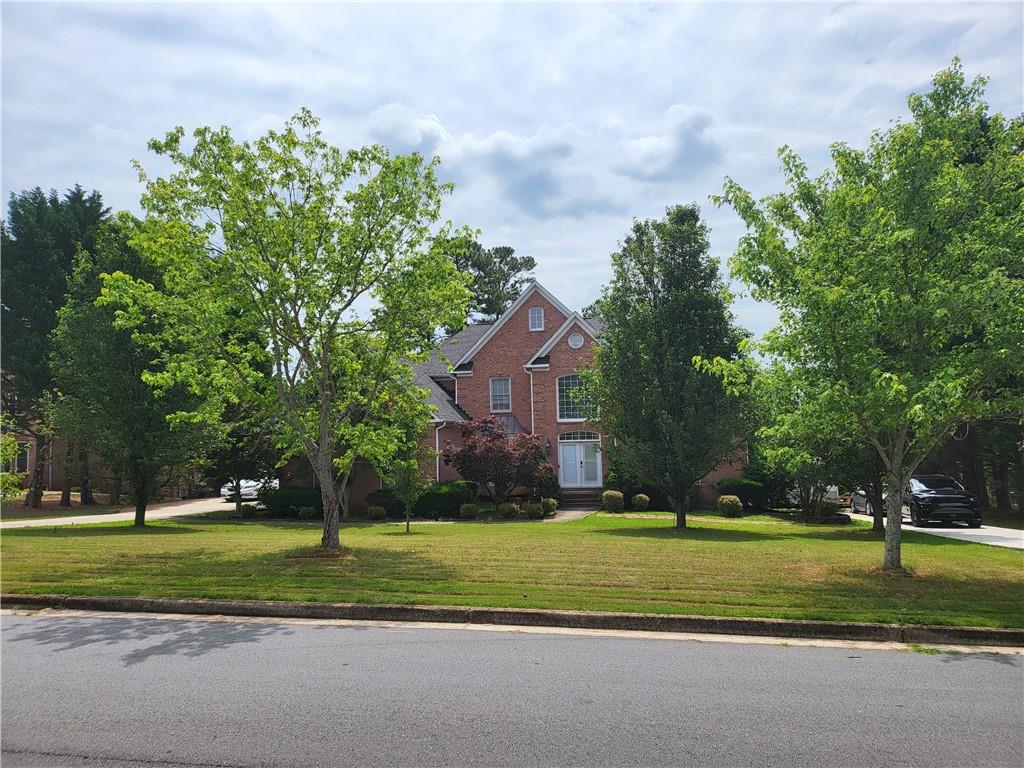 Beautiful water front property. Sitting on 1.2 acres. 7 bedrooms 5 full bathrooms. 2 kitchens, game room, weight room, 2 driveways. You name it this house has it. So bring your family and all your toys to a great community with no HOA. Owner is a licensed real estate broker