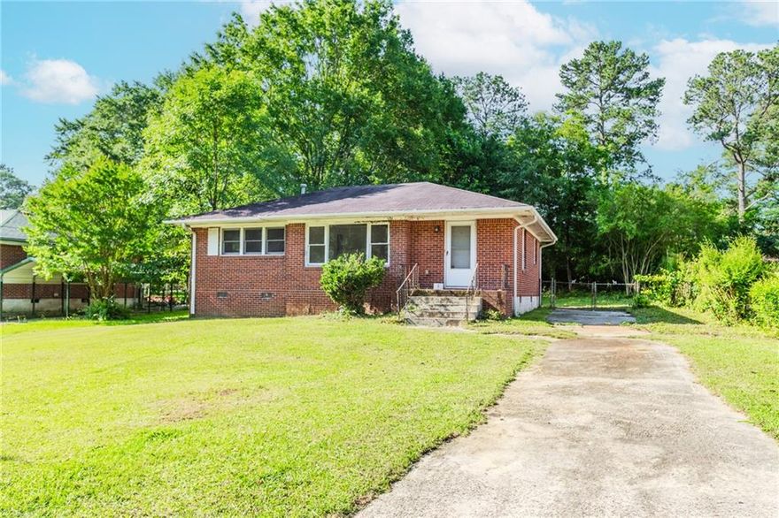 Step into a world of possibilities with this all brick ranch-style home, brimming with character and charm. Perfectly situated in a quiet neighborhood, this fixer-upper is ready to become the masterpiece you’ve been dreaming of. Whether you're a savvy investor or a homeowner with a vision, this is your chance to breathe new life into a classic. Inside, you’ll find an expansive layout with three generously sized bedrooms, each offering a blank canvas for your design ideas. The living and dining areas boast timeless features that hint at the home’s original allure, just waiting to be revitalized. Located just moments from shopping, local schools, and with seamless access to major roadways, the convenience of this property matches its potential. Imagine creating the perfect blend of modern updates and vintage charm to craft a one-of-a-kind home that stands out. Don’t miss the opportunity to turn this diamond in the rough into your dream space.